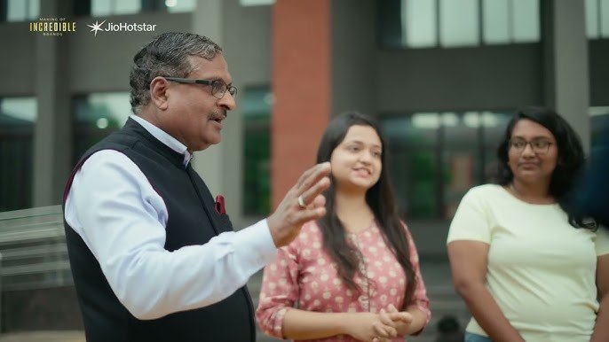 An on-location Making of Incredible Brands shoot at IIM Sambalpur — a mentor speaking with students